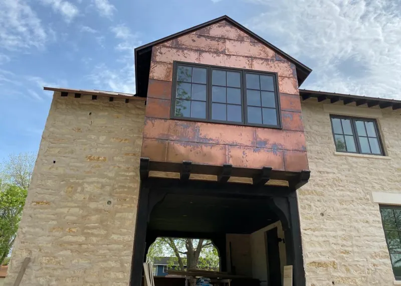 Copper metal panel facade on a stone building for Skylight Installation in Wyomissing
