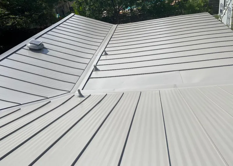 Solar attic fan installed on a metal roof for Roof Ventilation in Wyomissing